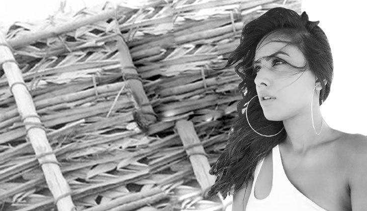 Nia Sharma ditches the shoot; jet skis like boss in white swimwear