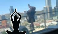 Oh No! Woman falls from balcony while attempting a Yoga asana; see viral pic