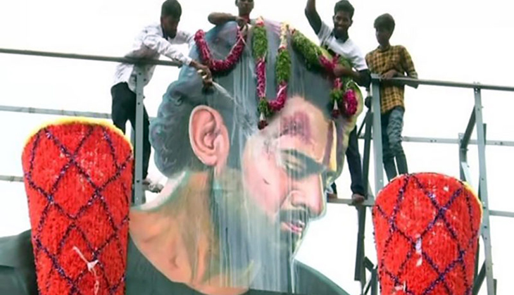 To celebrate 'Saaho' release, Prabhas fans pour milk on actor's cutout