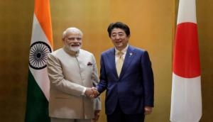 PM Modi meets Japanese PM Shinzo Abe in Russia