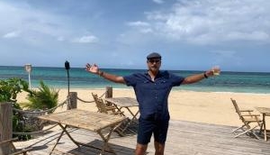 Ravi Shastri gets trolled on twitter for posing with divine punch in Jamaica