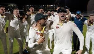 Steve Smith mocks England's Jack Leach while celebrating the victory at Old Trafford