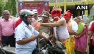 Gujarat: Lord Ganpati offers laddu to those riding bike wearing helmet in Rajkot