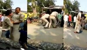 Motor Vehicles Act: UP cops thrash man for violating traffic rules, suspended