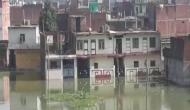UP: Flood like situation looms over Prayagraj, people take shelter on roofs