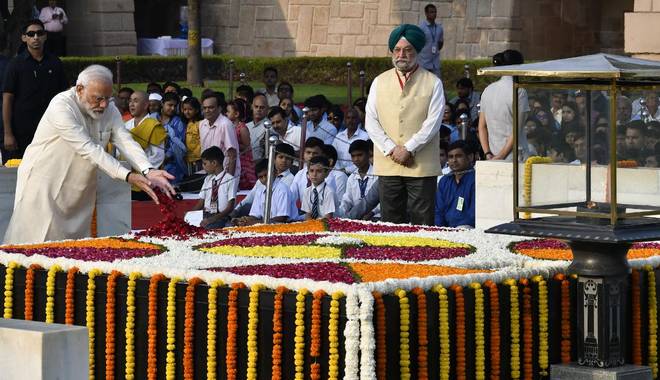 PM Modi pays homage to Mahatma Gandhi at Rajghat on his 150th birth anniversary