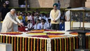 PM Modi pays tribute to Mahatma Gandhi at Raj Ghat