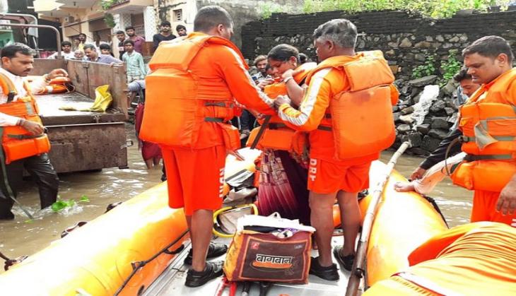 NDRF and SDRF disburse funds for Karnataka flood victims