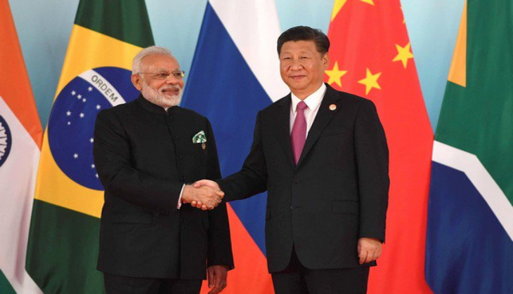 India's Narendra Modi to host China's Xi Jinping at summit, with ties strained by Kashmir