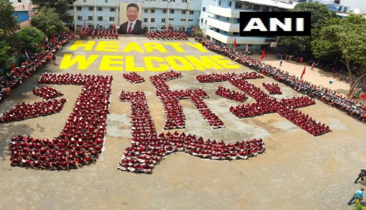 Wearing Xi Jinping's masks, around 2000 students welcome Chinese President in unique way