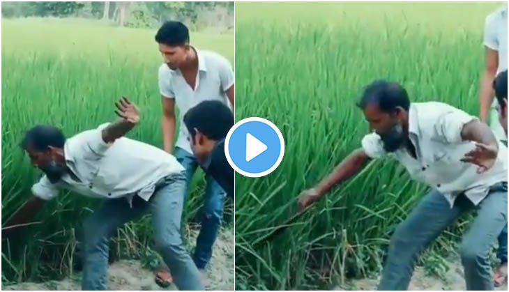 Hilarious! Man tries to catch snake from grass field, what he finds next will tickle your funny bones!