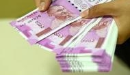 Rupee slips marginally in opening deals