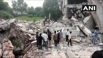 Building implodes in Gujarat's Vadodara, many feared trapped