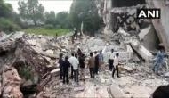 Building implodes in Gujarat's Vadodara, many feared trapped