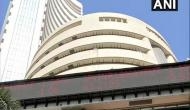 Equity indices trade 1 % lower, Bandhan Bank dips by 9.8 %