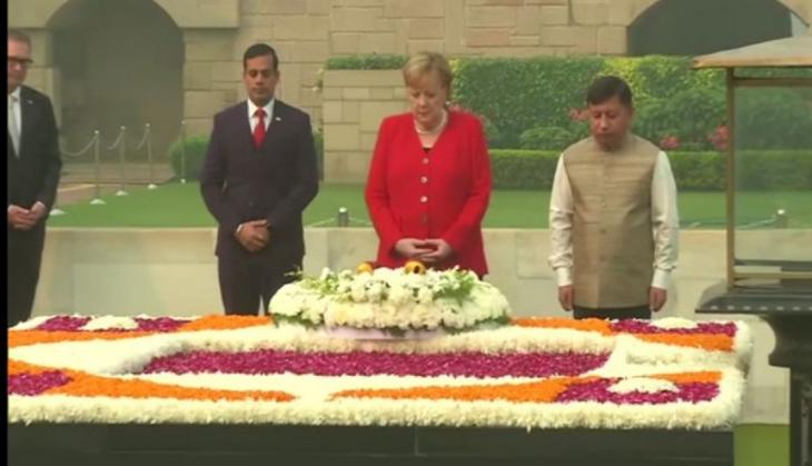 German Chancellor Angela Merkel pays floral tribute to Mahatma Gandhi at Rajghat