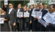 Delhi: Angry lawyers gather outside district courts