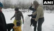 J-K: Tourists enjoy snowfall in Pahalgam