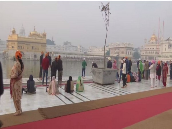 Devotees throng Golden Temple on 550th birth anniversary of Guru Nanak Dev