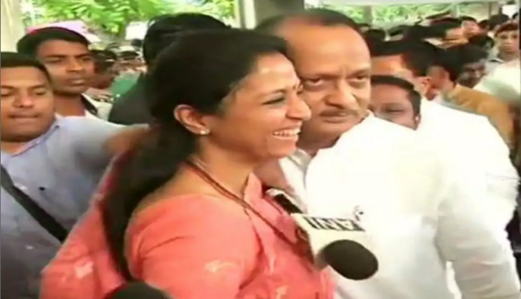 NCP chief Sharad Pawar's daughter Supriya Sule greets cousin Ajit Pawar with a hug before Maha session