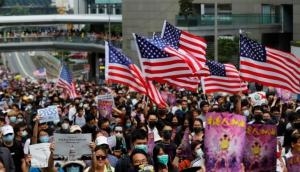 China accuses US of 'interference' after Trump signs Hong Kong legislation