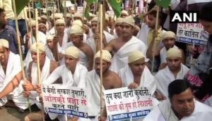 Godse Remark: Youth Congress workers dressed as Mahatma Gandhi protest against Pragya Thakur