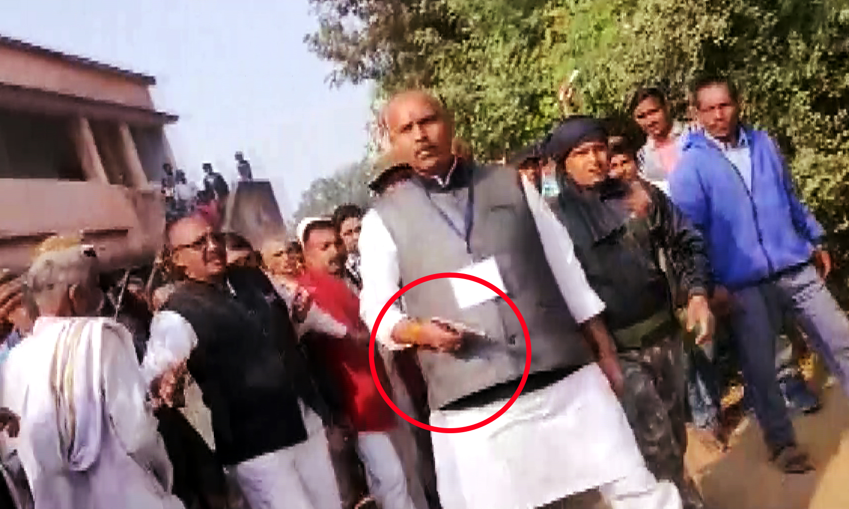 Watch: Jharkhand Polls; Congress' KN Tripathi brandishes pistol after scuffle breaks out with BJP