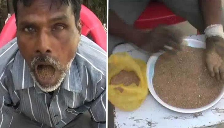Man Eating Sand