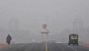 Delhi Weather Alert: National capital wakes up to chilly morning; dense fog wraps city 
