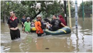 Indonesia Flood: Rescuers hunt for missing after 43 killed