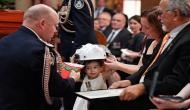 Australia Bushfire: Firefighter’s 19-month-old daughter wears father’s helmet at his funeral
