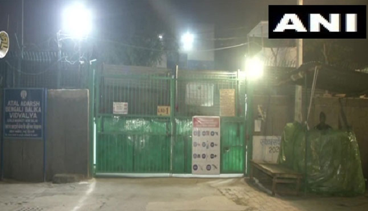 Delhi Election Results 2020: AAP workers stand guard outside EVM strongrooms to keep vigil 