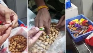 Dubai-bound passenger smuggles foreign currency worth Rs 45 lakh in biscuits, peanuts; held at Delhi airport [VIDEO]