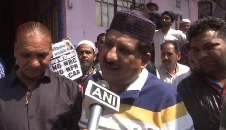 Congress MLA Arif Masood distributes posters reading 'No CAA, No NPR, No NRC' in Bhopal