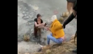 Watch how this brave woman risks her life to rescue dog from icy pond