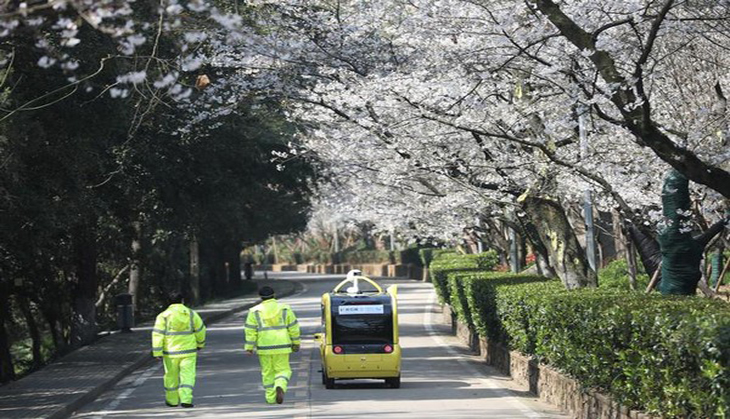 Coronavirus: Wuhan buses hit roads after two-month lockdown