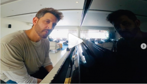 Inspired by 21 days lockdown Hrithik Roshan tries hand on piano while ex-wife Sussanne Khan photobombs [VIDEO]