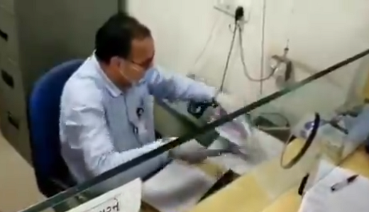 Banker uses steam iron to disinfect cheque given by customer amid COVID-19 fear; Anand Mahindra hails him