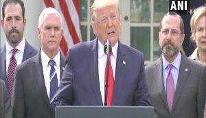 Donald Trump: World Health Organization funding on halt, 'mismanagement, cover-up allegations' being investigated