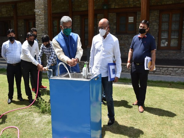 Coronavirus: Uttarakhand scientist gives demo of handwashing machine to CM Trivendra Singh Rawat
