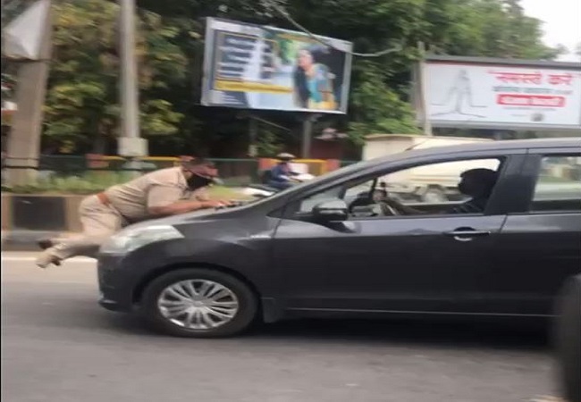 Coronavirus: Man drags policeman on car's bonnet in Jalandhar, amid COVID lockdown [Watch]