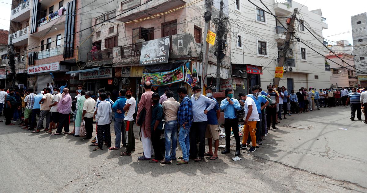 Delhi: Long queues, crowds continue at liquor shops despite tax hike