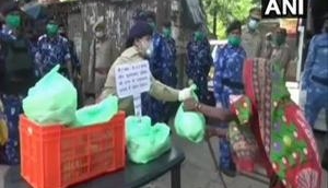 UP: Moradabad Police, RAF jawans help needy residents of city