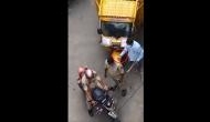 Hyderabad: 2 policemen suspended after they were seen taking bribe from an auto trolley driver [Watch]