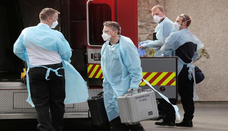 US reports over 50,000 coronavirus cases in highest single-day rise 