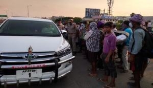  Andhra Chief Secy intervenes after he spots migrant workers walking on highway, puts them on special train to their homes