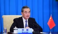Instead of blaming, help solve Covid-19 in face of mounting global challenges, says China's Wang Yi