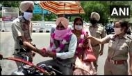 Lockdown 4.0: Amid lockdown Patiala man takes his bride home on motorbike, police garland newly-wed couple 