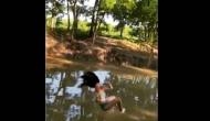 Oh No! Woman’s rope swing stunt goes wrong, falls badly in water; see viral video