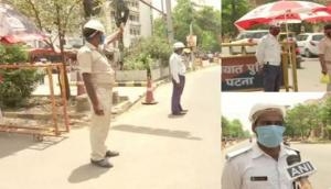 Amid scorching heat Bihar cops perform duties; urge people to stay indoors